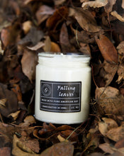 Load image into Gallery viewer, Fall Leaves fall scented soy wax candle in pile of leaves